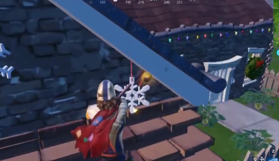 Snowflake Decorations Dangling from Houses